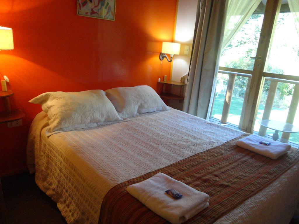 Cabanas Spa Bungalows Huarranchi Pucón Oda fotoğraf
